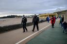Police patrols on Barry Island. Picture: PA/Ben Birchall
