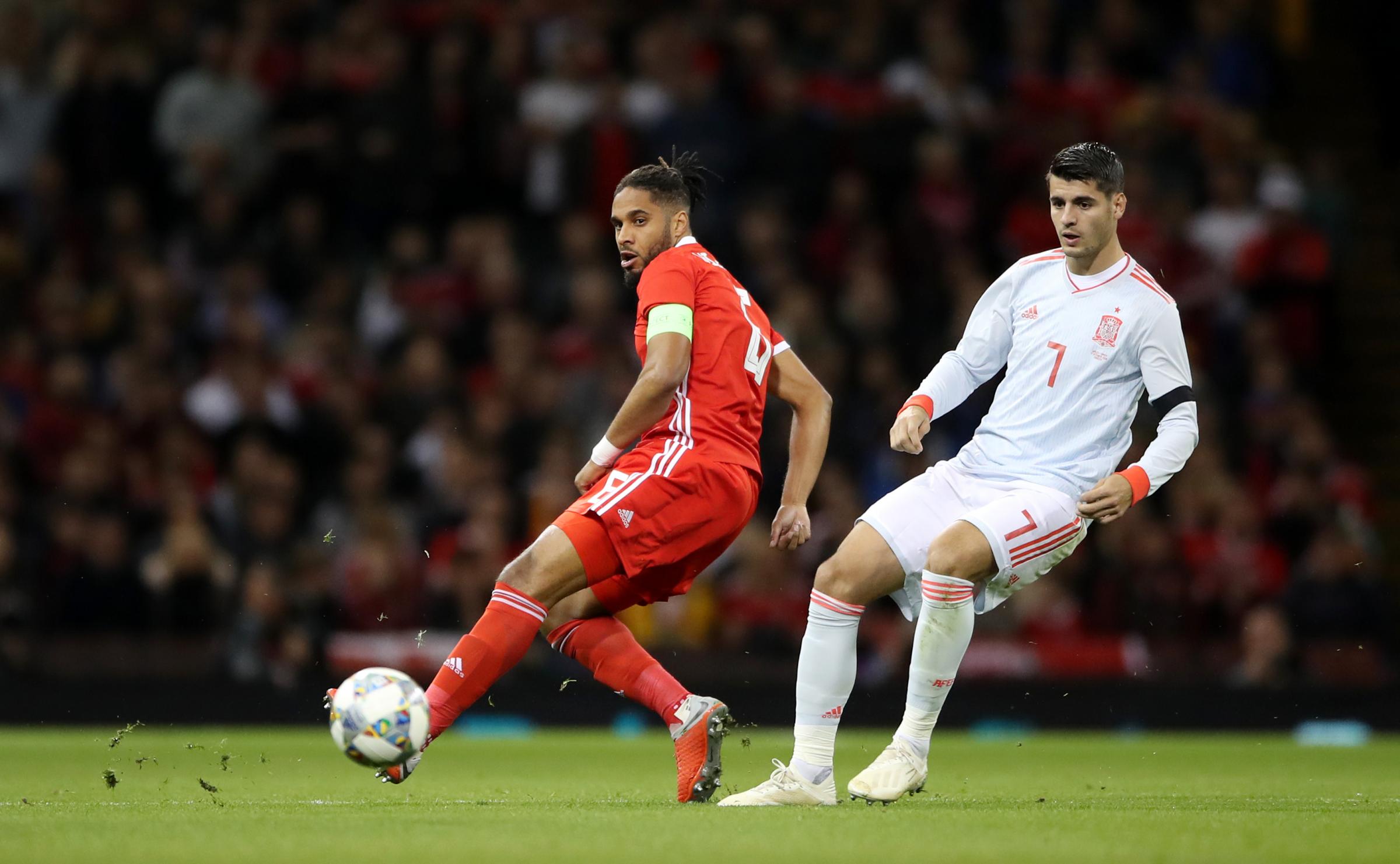 Wales Ashley Williams (left) and Spains Alvaro Morata (centre) during the International Friendly match at the Principality Stadium, Cardiff..