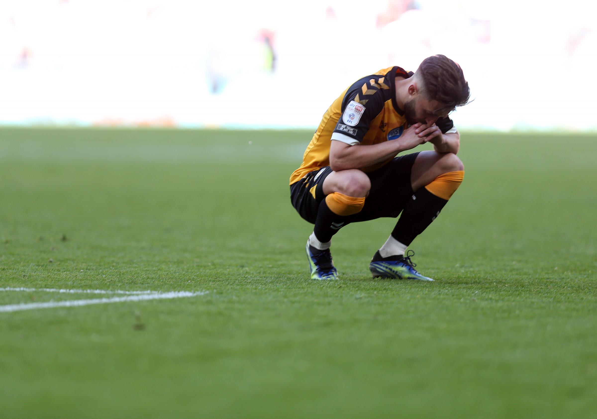 31.05.21 - Morecambe v Newport County, SkyBet League 2 Play Off Final - Dejected Josh Sheehan of Newport County at full time.