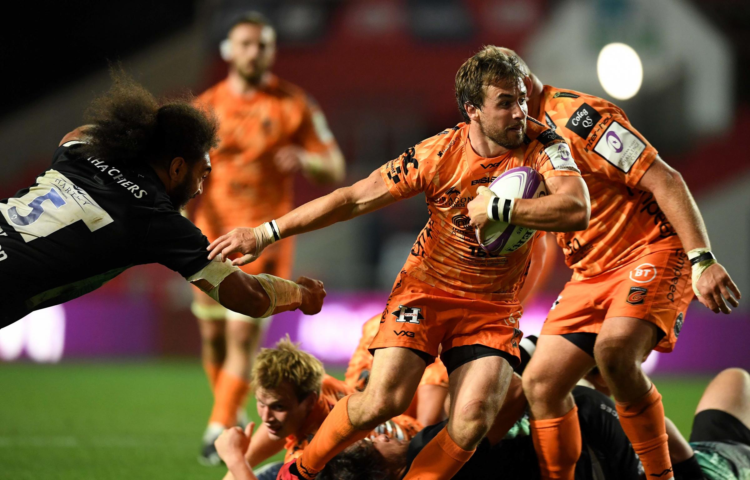 SNIPE: Rhodri Williams goes for a gap in the Dragons clash with Bristol