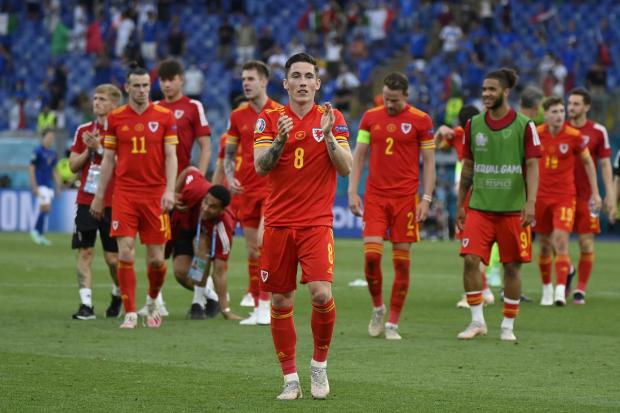 Wales' Harry Wilson applauds fans at the end of the Euro 2020 soccer championship group A match between Italy and Wales, at the Rome Olympic stadium, Sunday, June 20, 2021. (Riccardo Antimiani, Pool via AP).