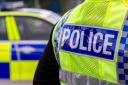 Police have charged a 50-year-old after items worth around £12,000 and £1,000 in cash were stolen.