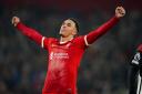 Liverpool’s Trent Alexander-Arnold celebrates after his late winner (Peter Byrne/PA)