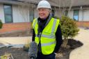 Welsh rugby legend Sir Gareth Edwards gets stuck  in at new hospital garden