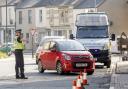 Police at a vehicle checkpoint in York where officers from North Yorkshire Police were ensuring that motorists and their passengers are complying with government restrictions and only making essential journeys, after Prime Minister Boris Johnson put the