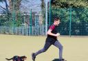 Alan, a residential pupil at Headlands School, runs with Dexter
