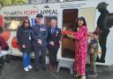 Penarth Town mayor Melissa Rabaiotti officially opens the new Poppy Caravan with Kay Brinkworth (L), Will Henry and Paul Galsworthy