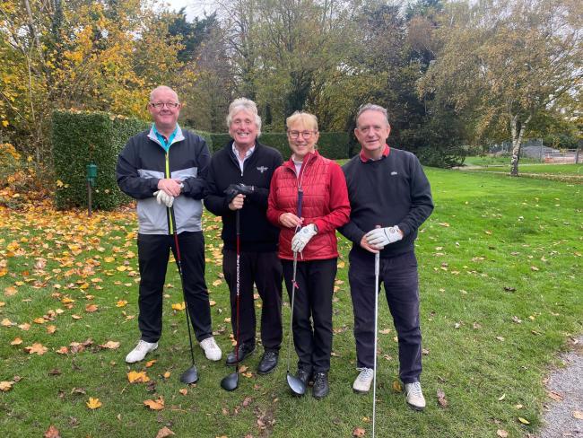 Phil Parker with his playing partners Ian Prothero, Joy Seculer and Nick Adams about to tee off