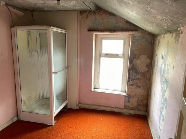 Penarth Times: The flat in Hickman Road, Penarth, does need some work. Picture: Rightmove