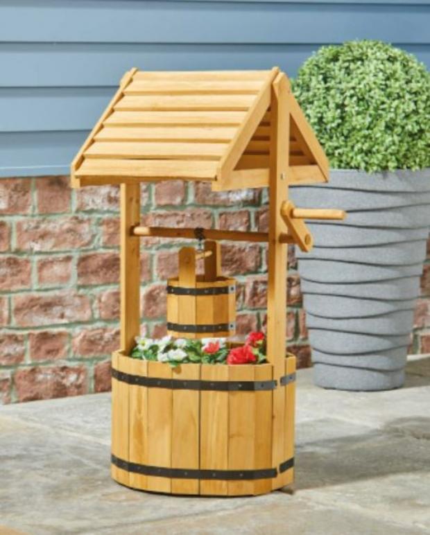 Penarth Times: Natural Wooden Wishing Well Planter (Aldi)