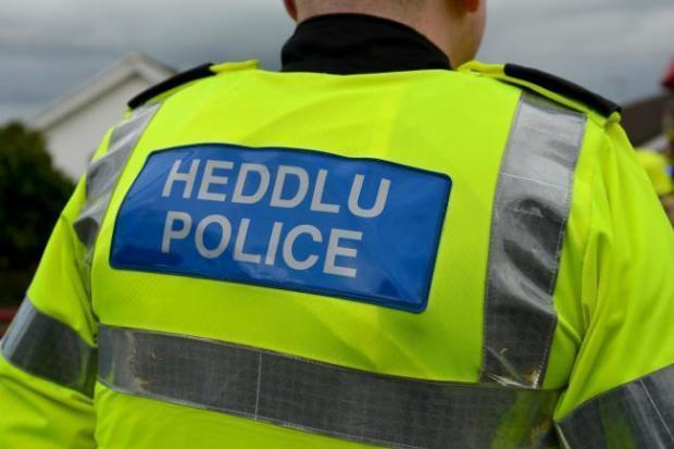 Dyfed-Powys Police are investigating a broken window.