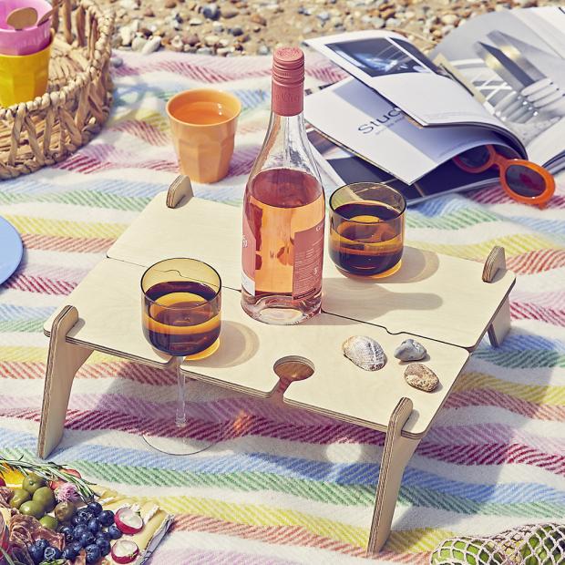 Penarth Times: Personalised Portable Picnic Table Wine Holder. Credit: Not On The High Street