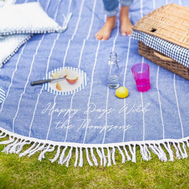 Penarth Times: Personalised Round Blue Picnic Or Beach Blanket. Credit: Not On The High Street