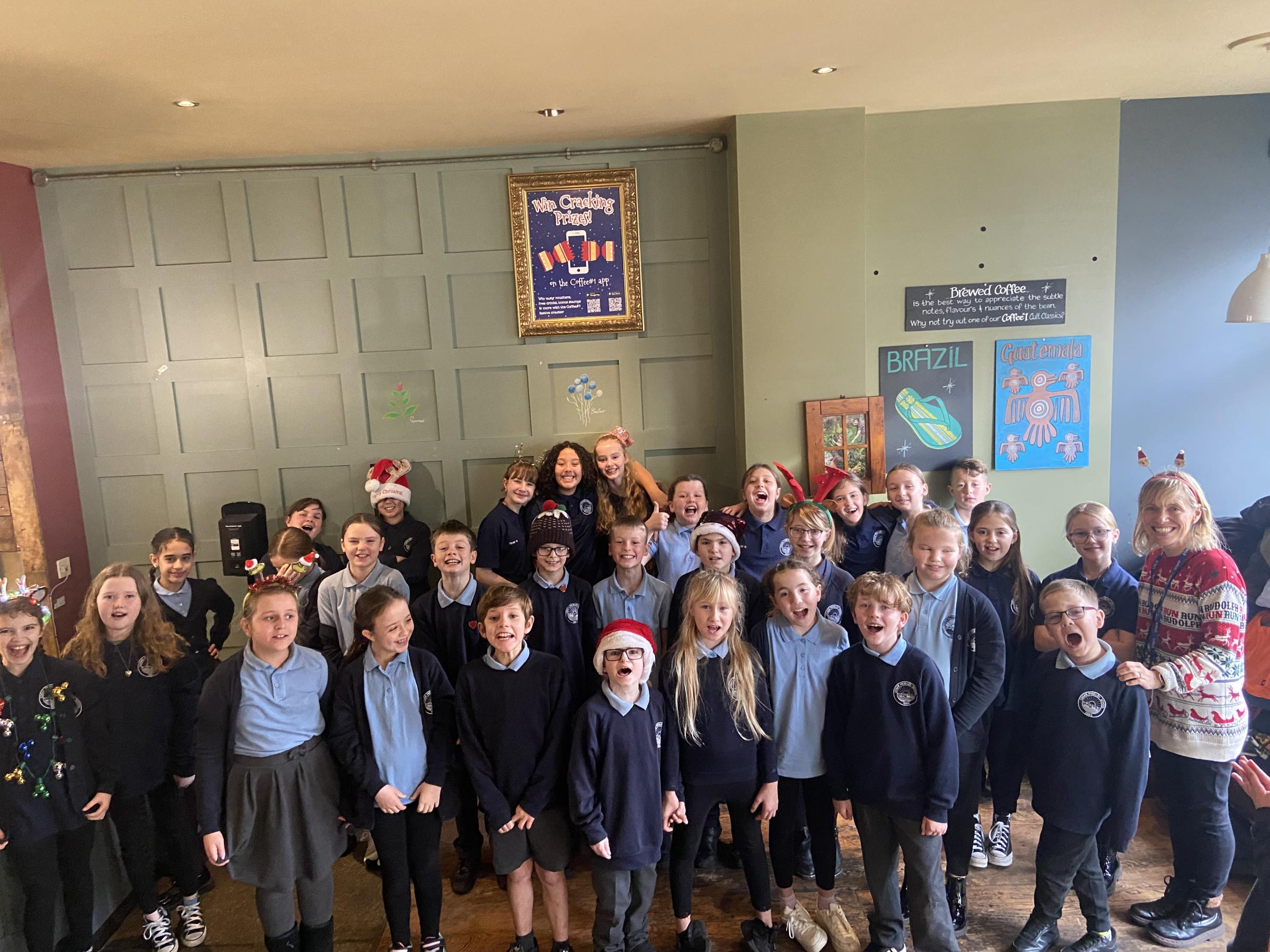 Penarth pupils spread festive joy with carols at Coffee 1 - Vimarsana News