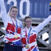 TOKYO TRIUMPH: Hannah Mills, right, and Eilidh McIntyre celebrate their gold medal in Japan last year. Picture: Kaoru Soehata/PA Wire