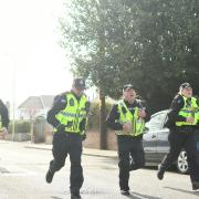 Police officers at the protest in Llantwit Major.