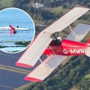 Horrified onlookers watch as a light aircraft crashes and flips over in the sea at Porthcawl. Pictures: Wales News Service