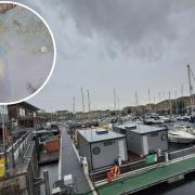 A mysterious film has appeared on the waters of Penarth Marina