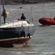 RNLI Penarth assisted Barry lifeguards in rescuing five casualties from boat stuck aground