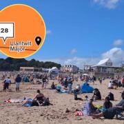 People enjoy the weather at Barry Island yesterday