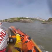 RNLI rescue group of boys in difficultly at sea yesterday, September 5 near Fontygary holiday park