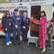 Penarth Town mayor Melissa Rabaiotti officially opens the new Poppy Caravan with Kay Brinkworth (L), Will Henry and Paul Galsworthy