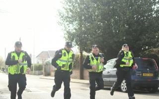 Police officers at the protest in Llantwit Major.